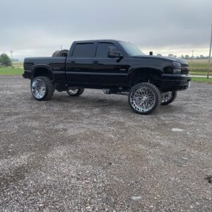 Black truck with new wheels