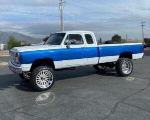 Blue and white truck with new wheels