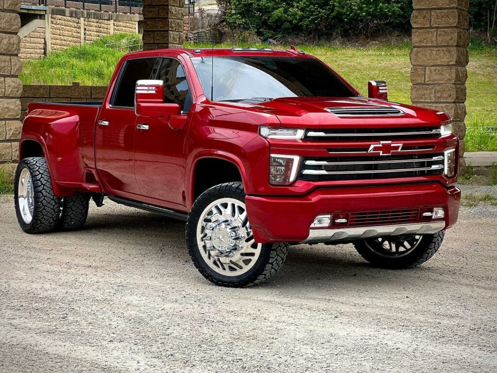 Red Chevy with new wheels