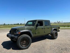 Green Jeep with new wheels
