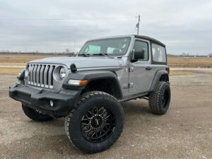Gray Jeep with new wheels